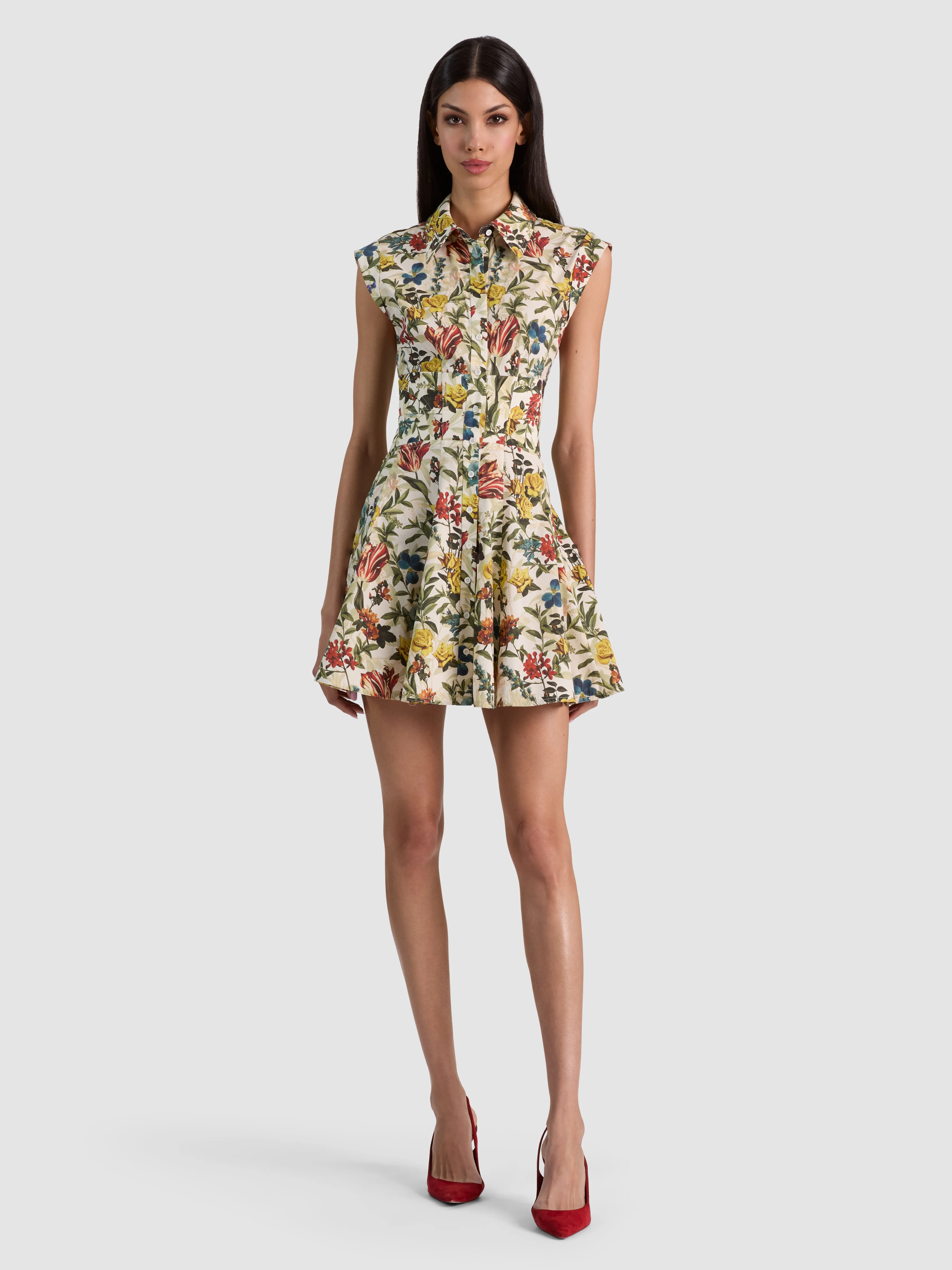 Front-facing editorial shot of the KIM CORSET SHIRT DRESS in Desert Sprigs Vanilla print, showing the structured corset bodice, front hook closures, and softly flared mini skirt.