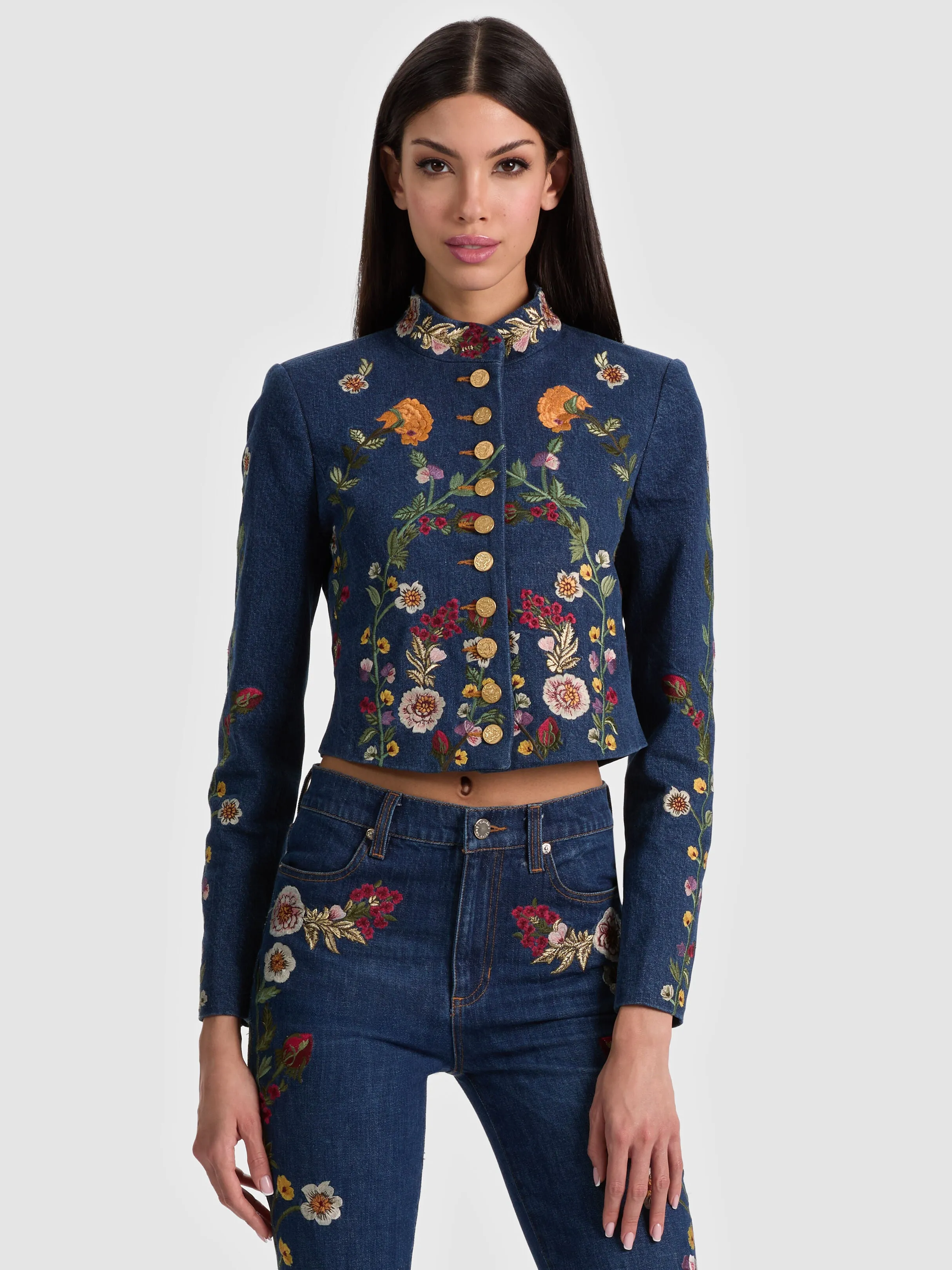 ALICE + OLIVIA Emerson Denim Military Jacket in dark wash with gold button closures and embroidery