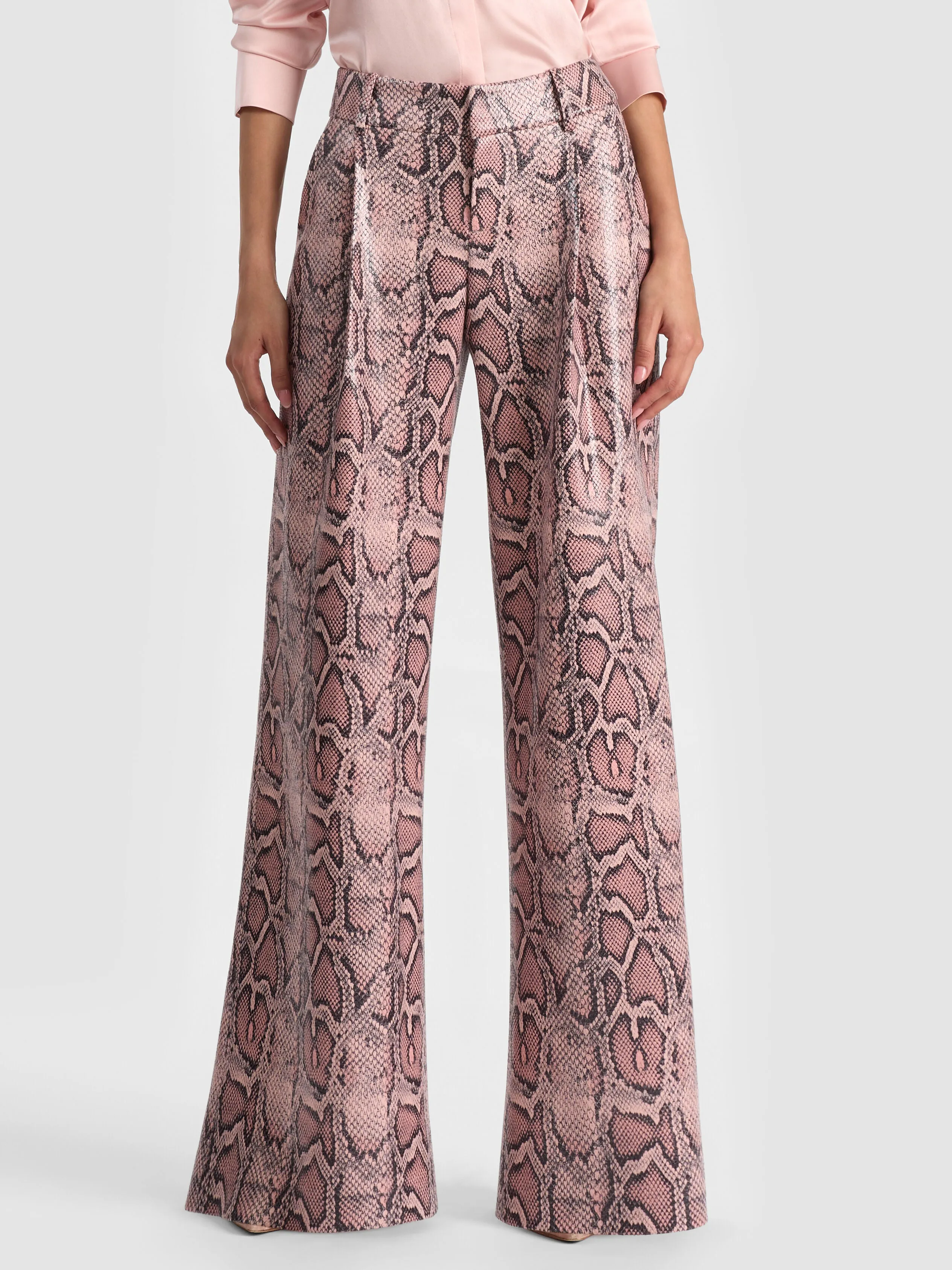 ALICE + OLIVIA Eric Vegan Snakeskin Pant in wide-leg vegan python print as worn by Nia Sioux at NYFW 2025