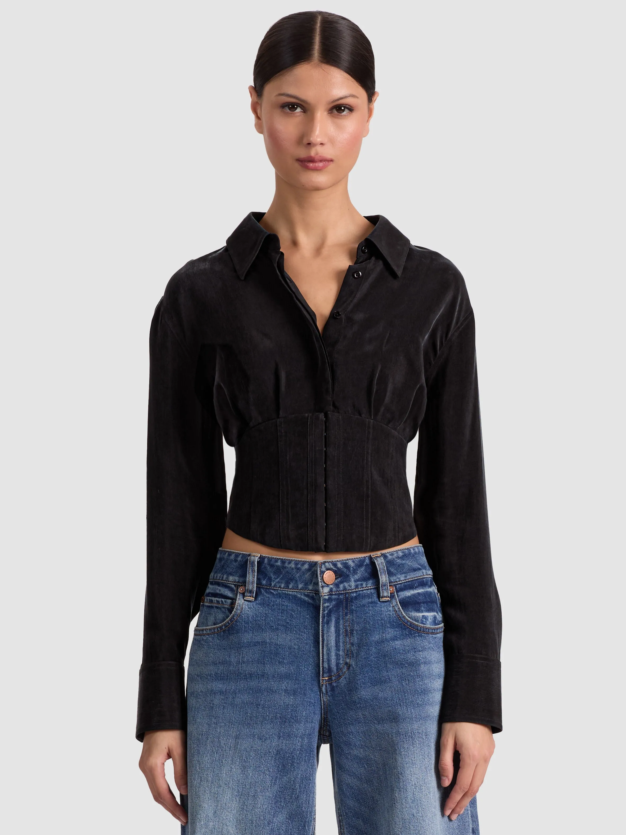 ALICE + OLIVIA Edie Seamed Corset Button Down in cupro fabric worn by Jess Hart at New York Fashion Week